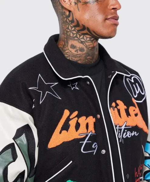 black boxy fit graffiti varsity jacket patched.webp
