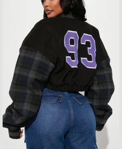 womens black chicago style cropped varsity jacket back.webp