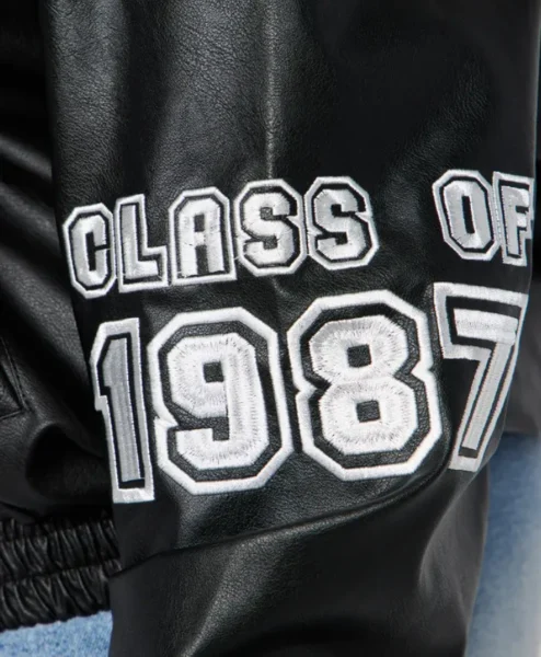 womens blue cropped class of 87 varsity jacket logo.webp