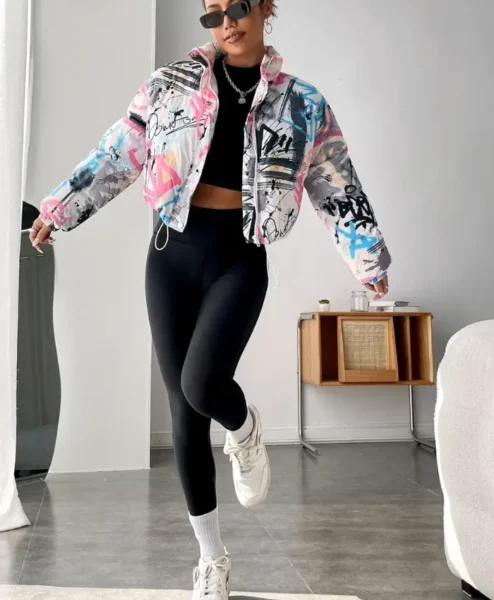 womens boxy fit puffer graffiti varsity jacket walk.webp