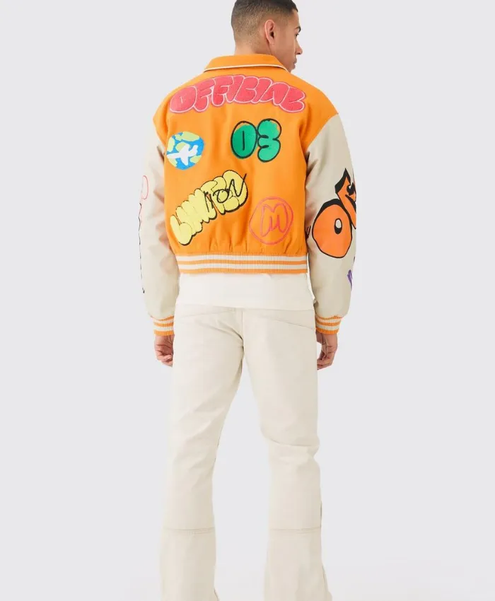 yellow boxy fit graffiti varsity jacket back side.webp