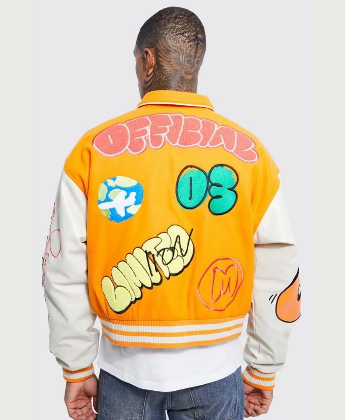 yellow boxy fit graffiti varsity jacket back.webp