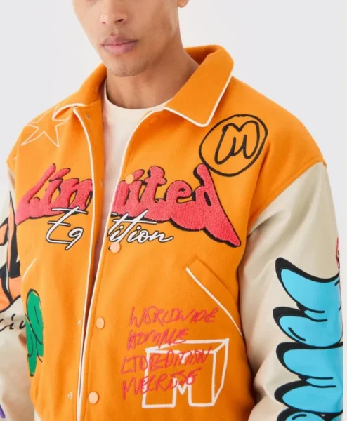 yellow boxy fit graffiti varsity jacket patched.webp