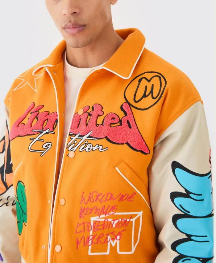 yellow boxy fit graffiti varsity jacket patched.webp