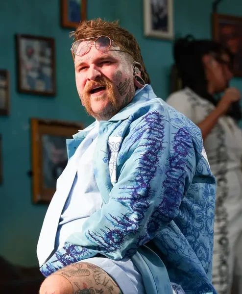 2026 Coachella Valley Music And Arts Festival Teddy Swims Blue Cotton Printed Coat Closeup.webp