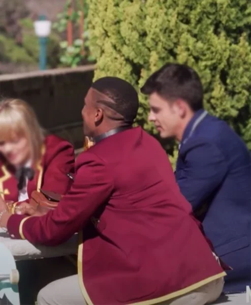 Blood Water S03 Leroy Siyafa Maroon Coat back.webp