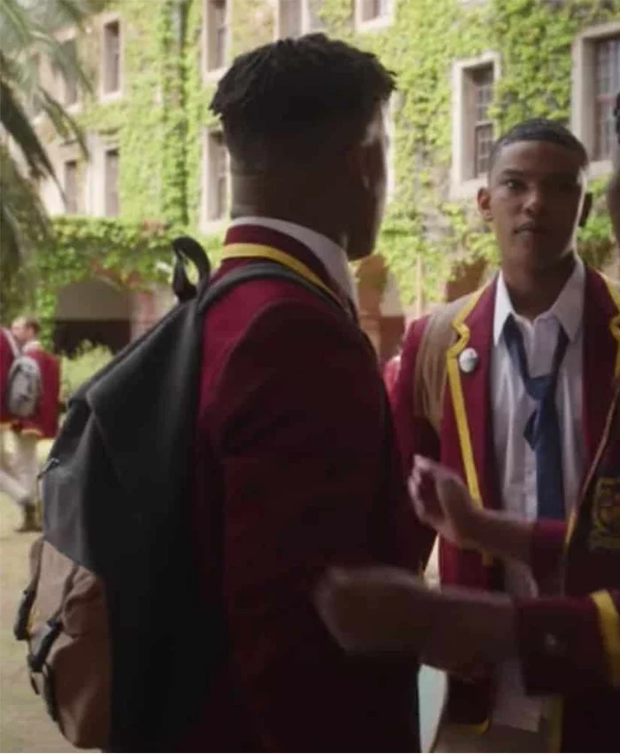 Blood Water S03 Leroy Siyafa Maroon Coat right.webp