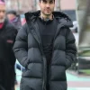 Brett Goldstein Office Romance Black Puffer Coat.webp