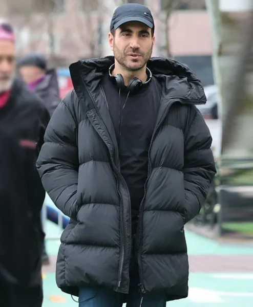 Brett Goldstein Office Romance Black Puffer Coat.webp