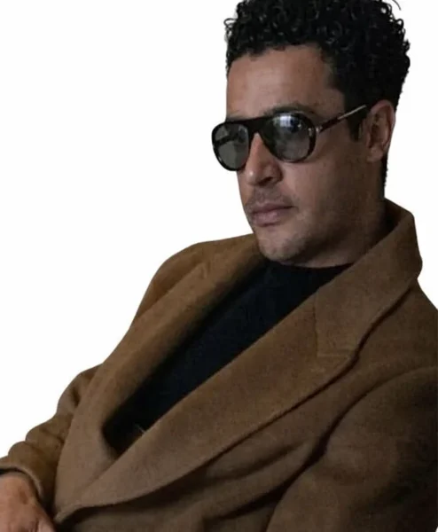 Christopher Abbott Kraven The Hunter Coat left.webp