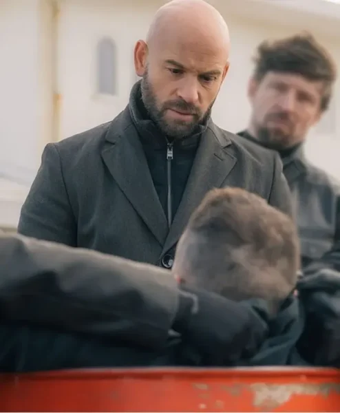 Franck Gastambide Carjackers Black Coat closeup.webp