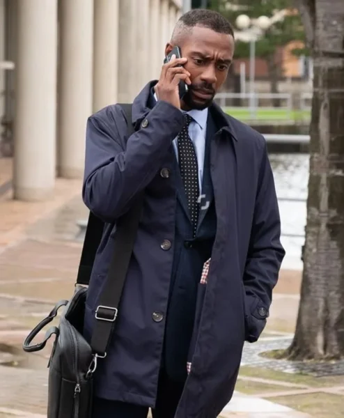 Out there S01 Michael Obiora Blue Coat.webp