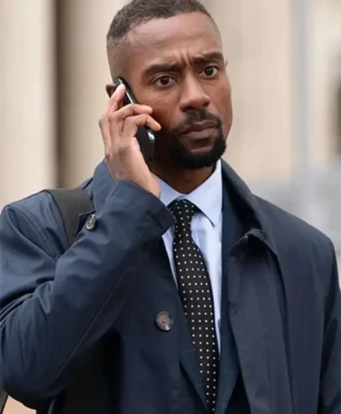Out there S01 Michael Obiora Blue Coat closeup.webp