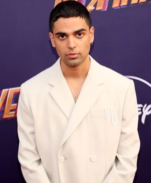 Rish Shah Ms. Marvel Event White Pea Coat closeup.webp