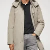 Simulant 2023 Sam Worthington Grey Coat.webp