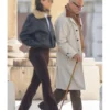 Stanley Tucci Fountain of Youth White Coat.webp