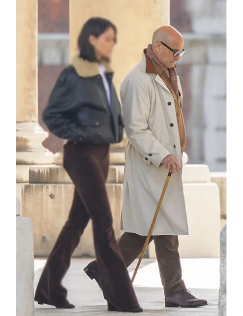 Stanley Tucci Fountain of Youth White Coat.webp
