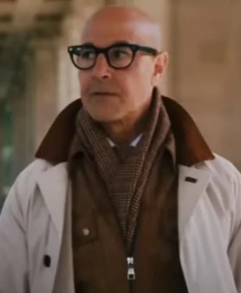 Stanley Tucci Fountain of Youth White Coat clsoeup.webp