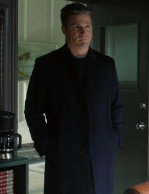 Stephen Amell Suits LA Black Coat.webp
