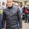 The Man from Toronto Woody Harrelson Black Coat front.webp