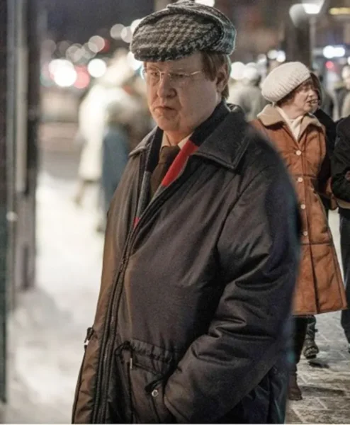 The Unlikely Murderer Robert Gustafsson Black Coat leftt.webp